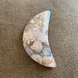 Crescent shaped flower agate crystal